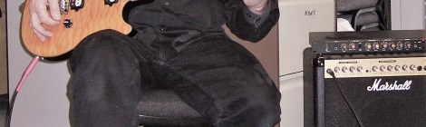 Steve Kenny playing guitar