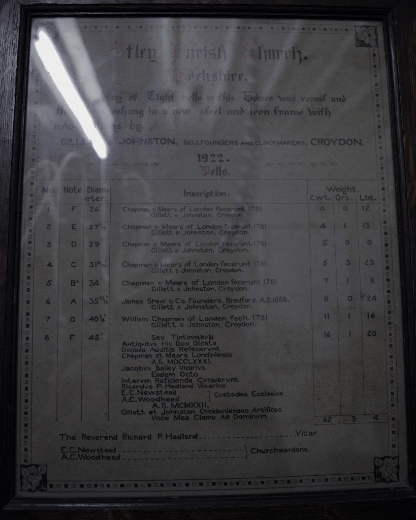 Famed picture showing bell Manufacturer and date with a table detail bells number, letter names and size and weights (notes are the scale of F major, with bells from 26 to 45 feet and weights between 4 and 16 hundredweight.
