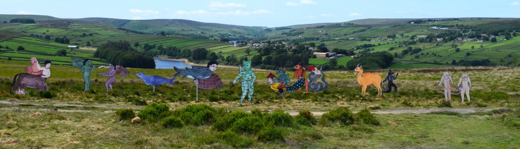A panoramic view from the moorland in the foreground the a several colourful half animal and half human 2-dimensional figures.